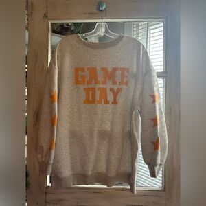 No source | Grey 'Game Day' Sweatshirt with Orange Stars